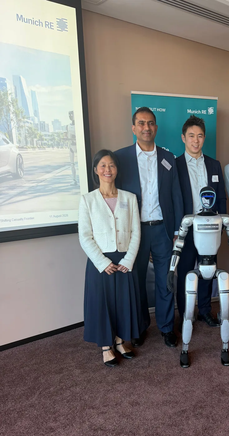 Rocco humanoid robot with Munich Re presenters at the Knowledge Brew client session